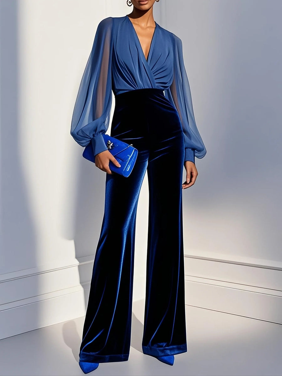 Zaira – lång jumpsuit i sammet med V-ringning och nätärmar